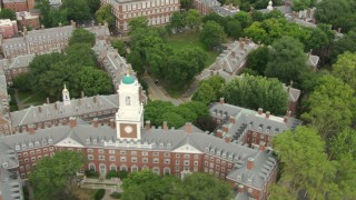 AF0001_000734 - HD aerial stock footage flyby Eliot House, tilt up to reveal Lowell House and Harvard University campus in Cambridge, Massachusetts