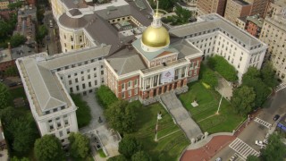 AF0001_000743 - HD aerial stock footage of the Massachusetts State House in Downtown Boston, Massachusetts