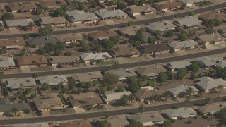 AF0001_000833 - HD aerial stock footage of streets lined with single story homes in Sun City, Arizona