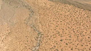 AF0001_000890 - HD stock footage aerial video of a bird's eye view of dry desert creek beds, New Mexico