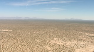 AF0001_000894 - HD aerial stock footage of a wide desert plain in New Mexico