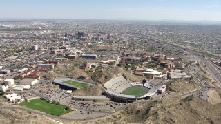 AF0001_000927 - HD aerial stock footage fly over Sun Bowl Stadium and the University of Texas El Paso, El Paso, Texas