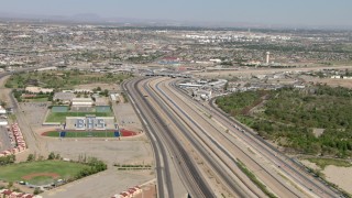 AF0001_000933 - HD stock footage aerial video of Bridge of the Americas and Bowie High School sports fields, El Paso/Juarez Border