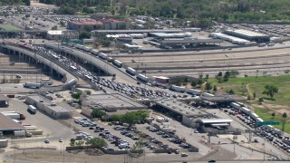 AF0001_000938 - HD aerial stock footage of a view of heavy traffic at the Bridge of the Americas on the El Paso/Juarez Border