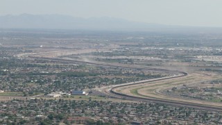 AF0001_000946 - HD stock footage aerial video of suburban neighborhoods near the fence on the US/Mexico border, El Paso, Texas
