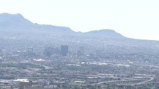 AF0001_000947 - HD stock footage aerial video of city buildings and a view of the Franklin Mountains in Downtown El Paso, Texas