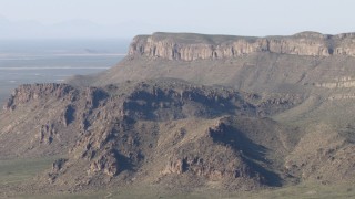 AF0001_000948 - HD stock footage aerial video of flying by a mountain range near El Paso, Texas