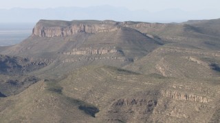 AF0001_000949 - HD stock footage aerial video of passing a barren mountain range near El Paso, Texas