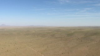 AF0001_000953 - HD stock footage aerial video flyby a desert plain near El Paso, Texas