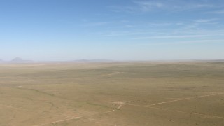 AF0001_000955 - HD stock footage aerial video flyby a wide arid plain near El Paso, Texas