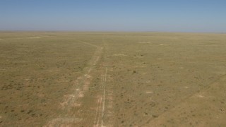 AF0001_000966 - HD stock footage aerial video of flying over an arid plain near El Paso, Texas