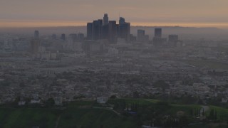 AF0001_000994 - 5K aerial stock footage of a view of Downtown Los Angeles skyline from the east at twilight, California