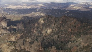 AF0001_001023 - 8K aerial stock footage of rugged desert mountains in Southern California