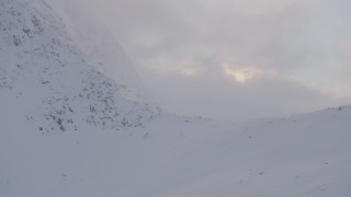 AK0001_0070 - 4K aerial stock footage reveal snow covered Chugach Mountains, Chugach National Forest, Alaska