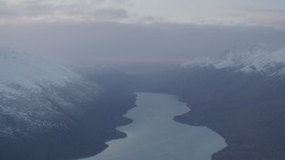 AK0001_0072 - 4K aerial stock footage approaching Eklutna Lake, bordered by Chugach Mountains, Eklutna Lake, Alaska
