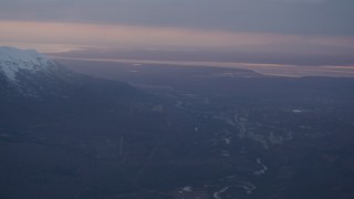 AK0001_0086 - 4K aerial stock footage panning right across Eagle River, Alaska, sunset