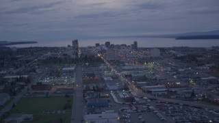 AK0001_0153 - 4K aerial stock footage flying by downtown skyline, Downtown Anchorage, Alaska, night