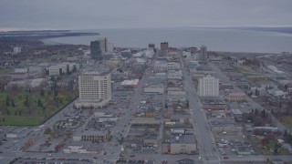 AK0001_0159 - 4K aerial stock footage approach Downtown, from East 6th Street to East Loop Bridge, Anchorage, Alaska