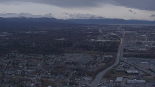 AK0001_0175 - 4K aerial stock footage Flying by neighborhoods, Chugach Mountains, Anchorage, Alaska