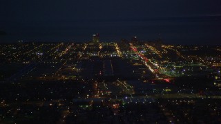 AK0001_0196 - 4K aerial stock footage approaching Merrill Field and Downtown Anchorage, Alaska, night