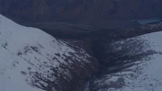 AK0001_0266 - 4K stock footage aerial video following river, revealing deep valley, Chugach Mountains, Alaska
