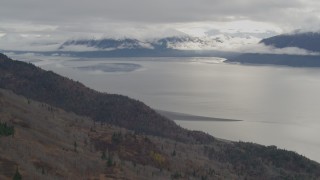 AK0001_0348 - 4K aerial stock footage approach snow capped Kenai Mountains, Turnagain Arm of the Cook Inlet, Alaska