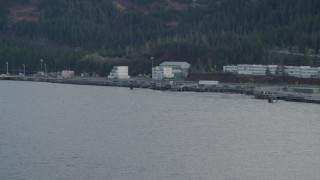 AK0001_0397 - 4K aerial stock footage flying low over the bay, approaching the dock, Whittier, Alaska
