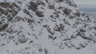 AK0001_0572 - 4K aerial stock footage approach snowy peak, Downtown Anchorage, Chugach Mountains, Alaska