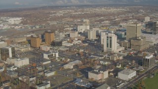 AK0001_0588 - 4K aerial stock footage flying by Downtown buildings, Downtown Anchorage, Alaska