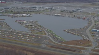 AK0001_0678 - 4K aerial stock footage Lake Hood Seaplane Base, Ted Stevens Anchorage International Airport, Anchorage, Alaska