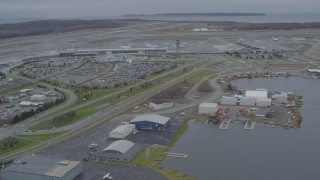 AK0001_0680 - 4K aerial stock footage Lake Hood Seaplane Base, Ted Stevens Anchorage International Airport, Anchorage, Alaska