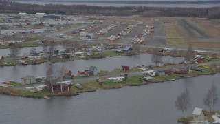 AK0001_0687 - 4K aerial stock footage flying by Lake Hood Seaplane Base, Lake Hood Strip, Anchorage, Alaska
