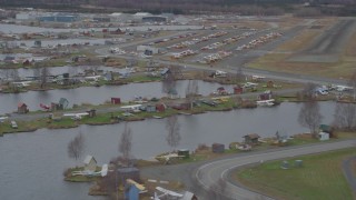 AK0001_0687 - 4K stock footage aerial video flying by Lake Hood Seaplane Base, Lake Hood Strip, Anchorage, Alaska
