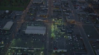 AK0001_0727 - 4K aerial stock footage following East 6th Street, revealing Downtown Anchorage, Alaska, twilight