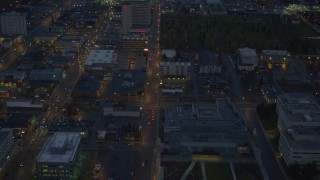 AK0001_0737 - 4K aerial stock footage West 6th Ave, Sheraton Anchorage Hotel and Spa, Downtown Anchorage, Alaska, night
