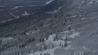 AK0001_0779 - 4K aerial stock footage flying over grassy slope, reveal Knik River Valley, Chugach Mountains, Alaska