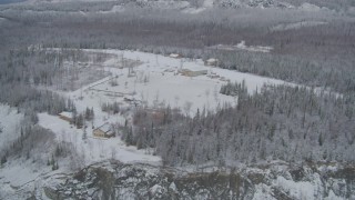 AK0001_0860 - 4K aerial stock footage flyby King Ranch, reveal snowy Matanuska River Valley, Sutton, Alaska