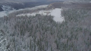AK0001_0861 - 4K aerial stock footage descend to snowy runway, King Ranch, Matanuska River Valley, Sutton, Alaska
