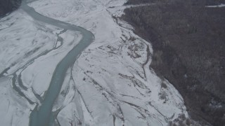 AK0001_0866 - 4K aerial stock footage flying over the snow-covered Matanuska River Valley, Alaska