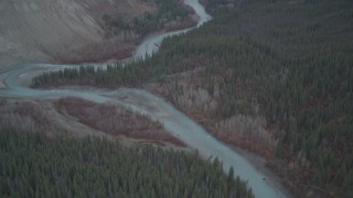 AK0001_0972 - 4K aerial stock footage flying over river and trees during winter, Klutina River, Alaska