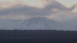AK0001_1048 - 4K aerial stock footage a snow covered Talkeetna Mountain peak, Alaskan Wilderness