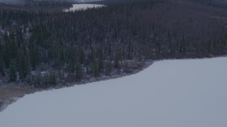 AK0001_1071 - 4K aerial stock footage forest and lake, snowy Chugach Mountains, Matanuska River Valley, Alaska