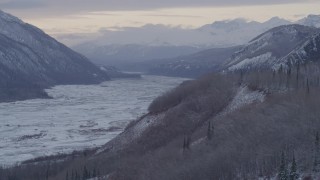 AK0001_1091 - 4K aerial stock footage the snow covered Talkeetna Mountains and Matanuska River Valley, Alaska