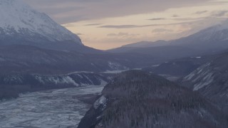 AK0001_1099 - 4K aerial stock footage snowy Matanuska River Valley and mountains at twilight, Alaska