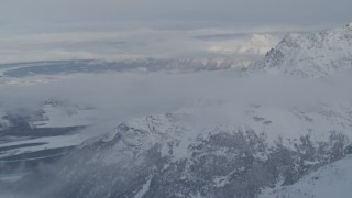 AK0001_1563 - 4K aerial stock footage snow covered Knik Fairview, Knik River Valley from Chugach Mountains, Alaska