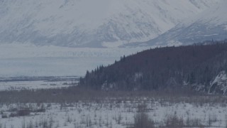 AK0001_1596 - 4K aerial stock footage the snow covered Knik Glacier seen from Knik River Valley, Alaska