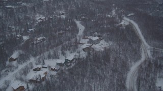 AK0001_1623 - 4K aerial stock footage snow covered residential neighborhoods in Chugiak, Alaska