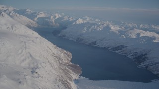 AK0001_1782 - 4K aerial stock footage tilt from snow covered Harriman Glacier to Harriman Fjord, Alaska