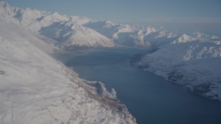 AK0001_1783 - 4K aerial stock footage flyby snow covered Chugach Mountains and Harriman Fjord, Alaska