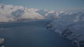 AK0001_1785 - 4K aerial stock footage Harriman Fjord bordered by snow covered Chugach Mountains, Alaska